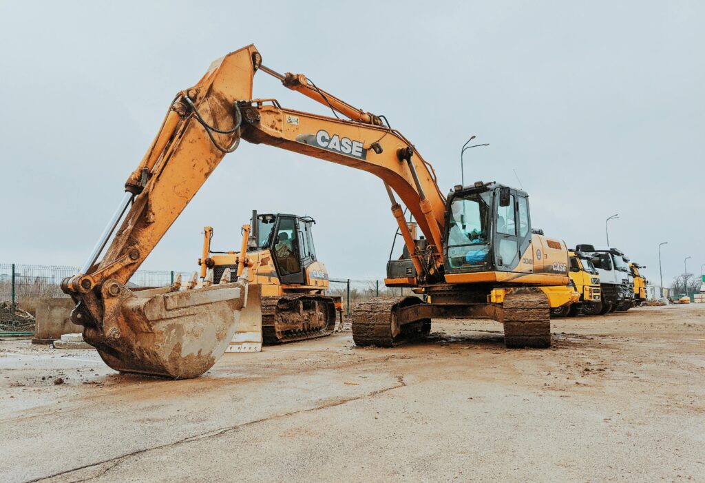 Excavator parked at a construction site showcasing heavy machinery and industrial work.